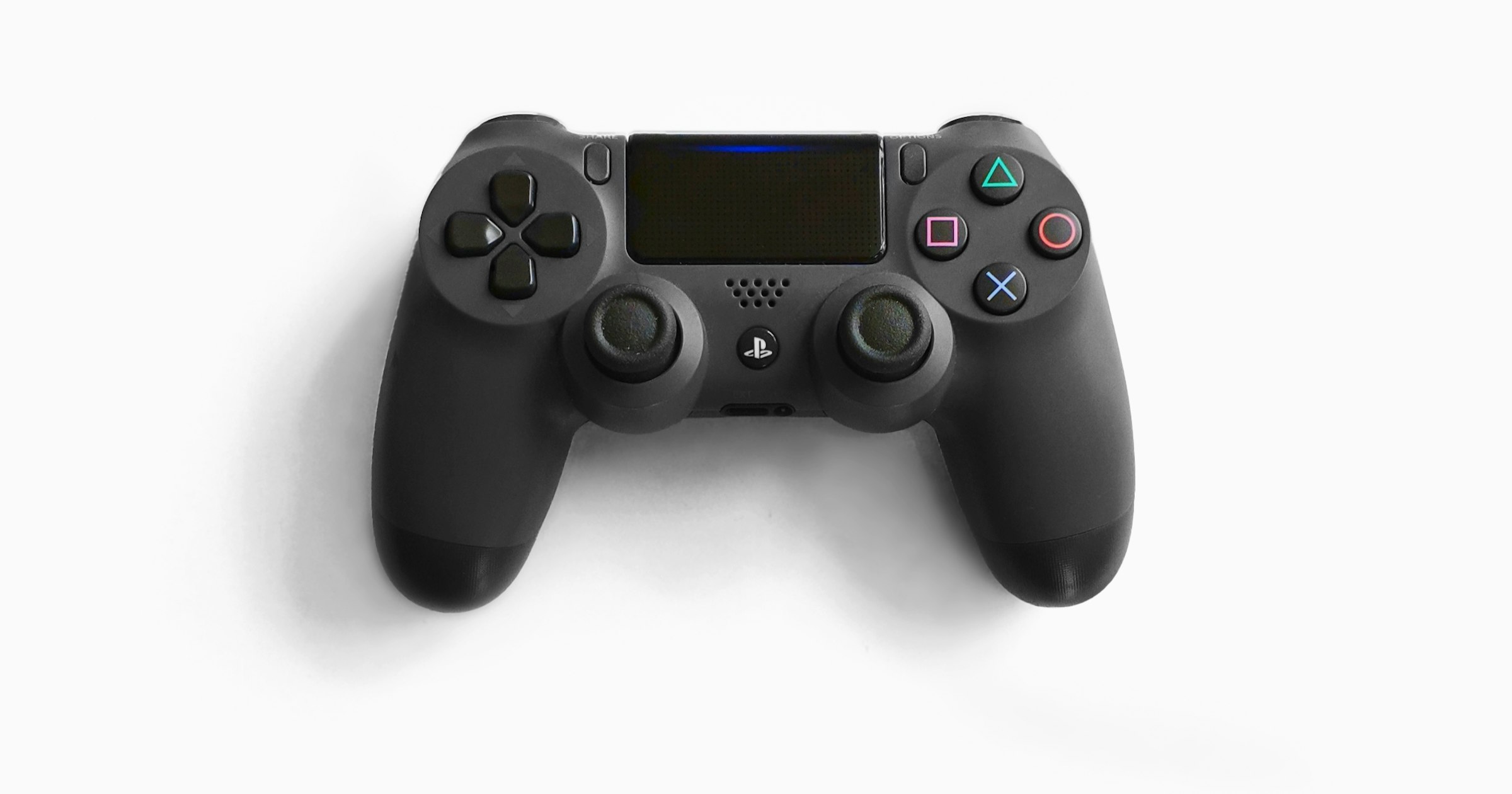 A video game controller on a white background
