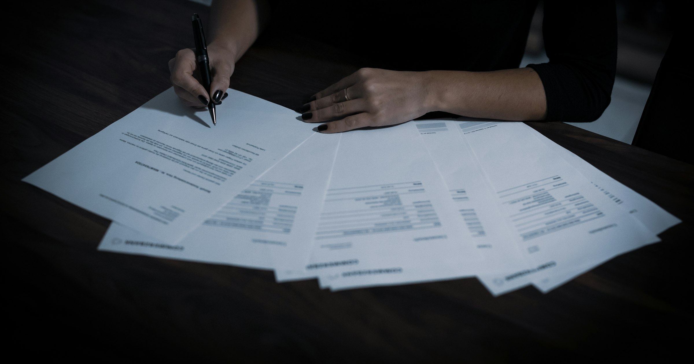 Reviewing formal filings on a desk, choosing between a UDRP complaint and a federal lawsuit
