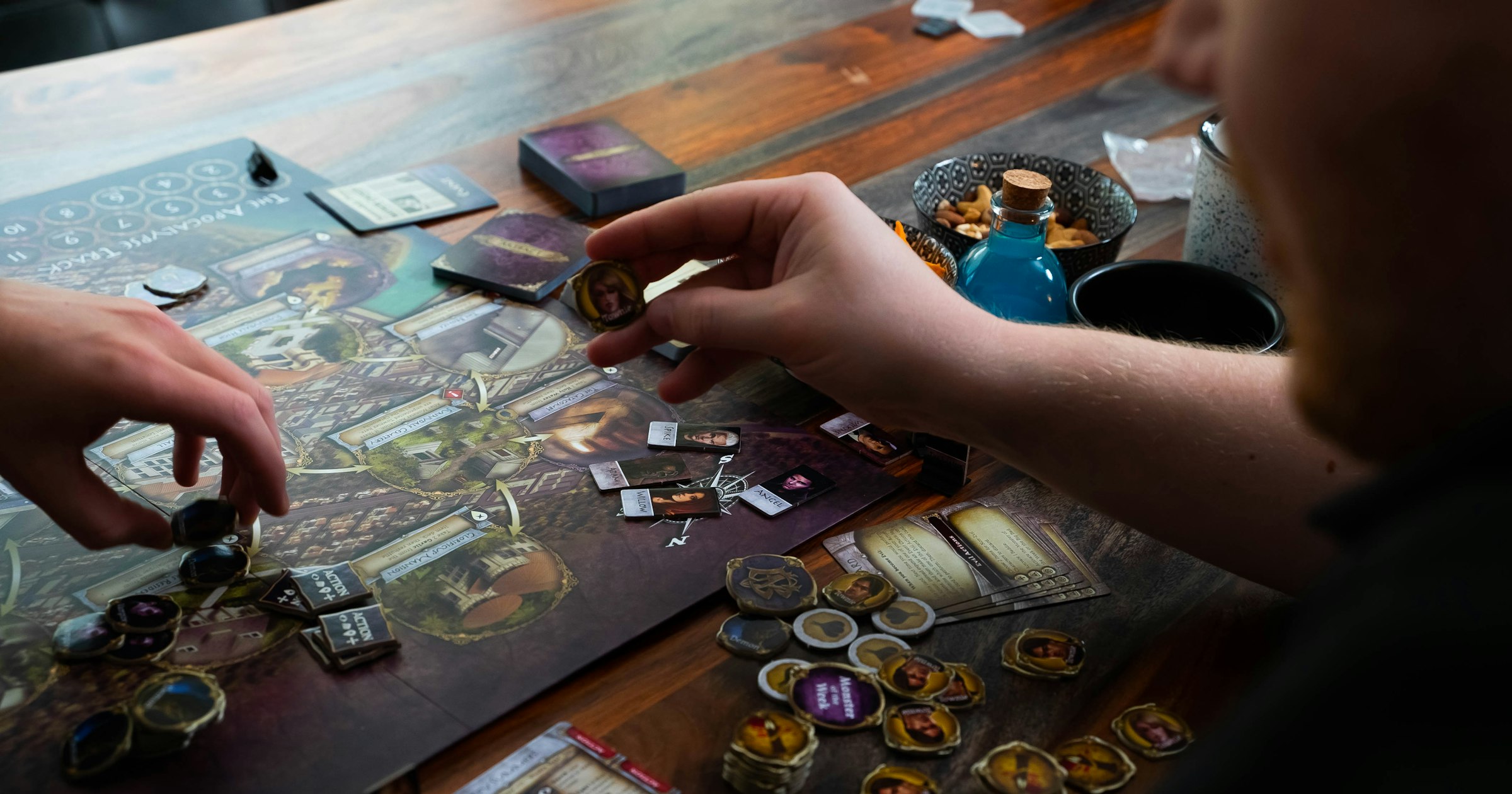 Players gathered around a tabletop game