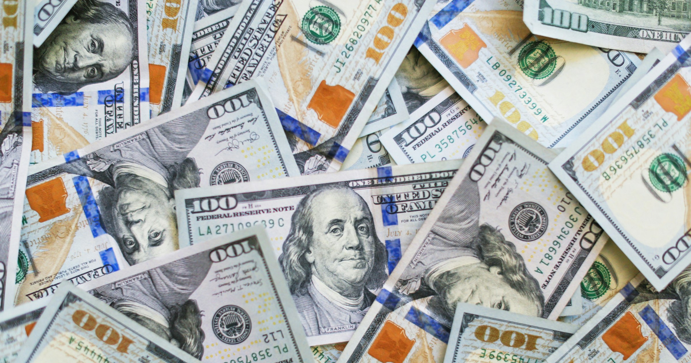 Stacks of cash representing giveaway prize value and prize taxes
